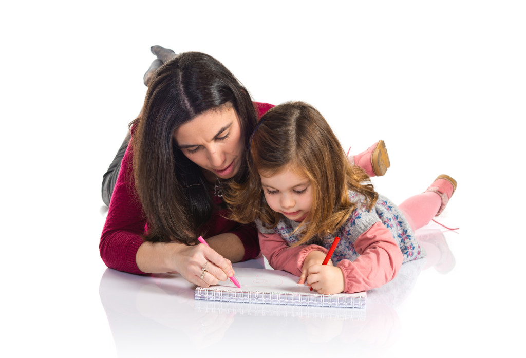 Mother and daughter studying together